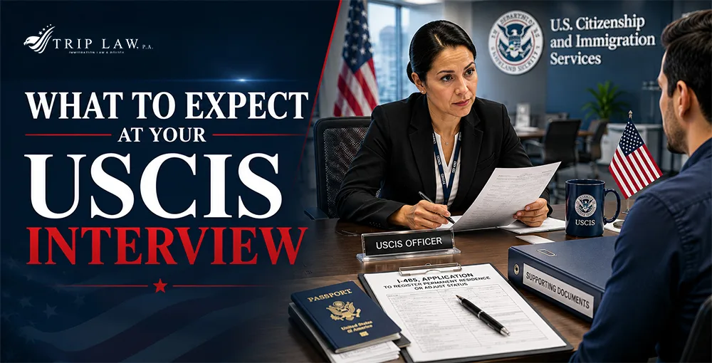 What to Expect During a USCIS Interview and How to Prepare USCIS officer conducting an immigration interview with an applicant reviewing documents and adjustment of status paperwork.